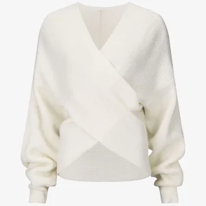Suéter liso con cuello cruzado y bajo asimétrico. - Blanco
