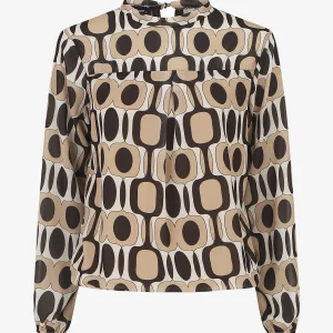 Blusa de manga larga con cuello redondo y estampado gráfico de los años 70. - Beis